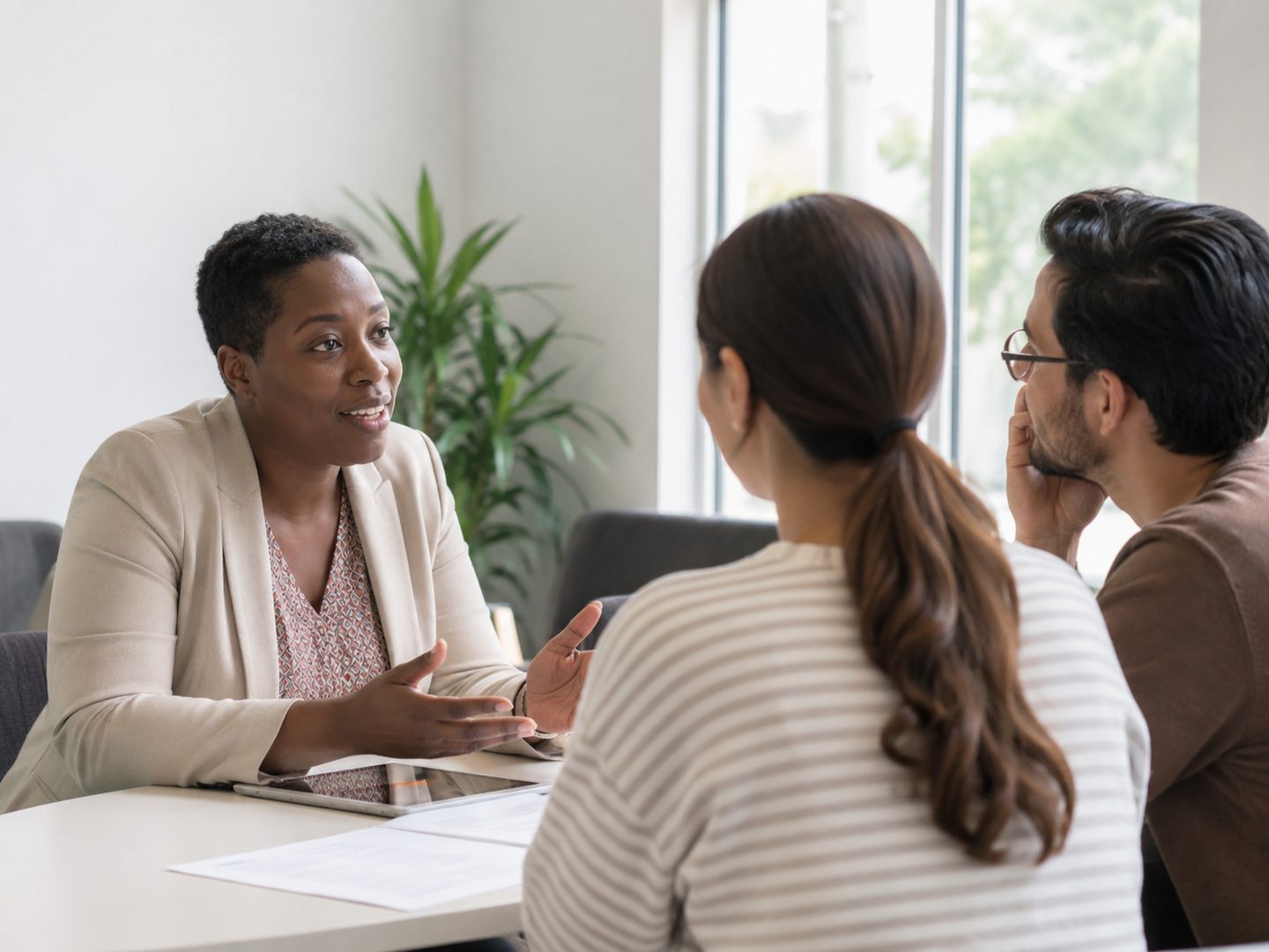 Advisor and participants in a practical career guidance conversation